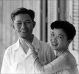Tran Le Xuan (April 15, 1924 – April 24, 2011), popularly known as Madame Nhu but more properly Madame Ngo Dinh Nhu, was considered the First Lady of South Vietnam from 1955 to 1963. She was the wife of Ngo Dinh Nhu, brother and chief adviser to President Ngo Dinh Diem. As Diem was a lifelong bachelor, and because the Nhus lived in the Independence Palace, she was considered to be the First Lady.<br/><br/>

Ngô Ðình Nhu (October 7, 1910 – November 2, 1963) was the younger brother and chief political advisor of South Vietnam's first president, Ngô Ðình Diệm. Nhu was widely regarded as the architect of the Ngô family's nepotistic and autocratic rule over South Vietnam from 1955 to 1963. Although Nhu did not hold a formal executive position, he wielded immense unofficial power, exercising personal command of both the ARVN Special Forces (a paramilitary unit which served as the Ngô family's de facto private army) and the Cần Lao Party, which served as the regime's de facto secret police.